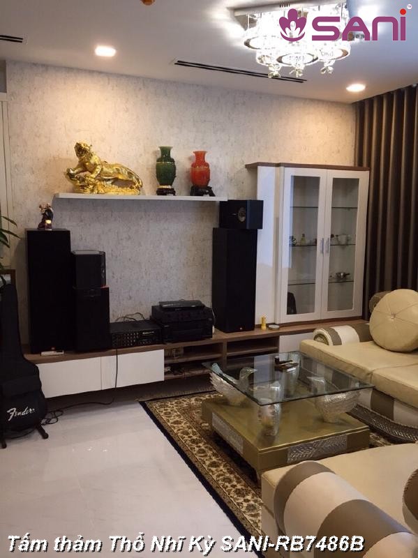 Trải tấm thảm hoa văn tạo điểm nhấn mới phòng khách lam moi phong khach tham trang tri sani 2